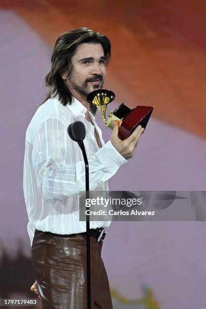 Juanes accepts the award for Best pop/rock album onstage during the Premiere Ceremony for The 24th Annual Latin Grammy Awards on November 16, 2023 in...