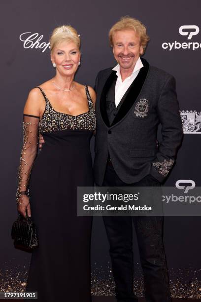 Karina Mroß and Thomas Gottschalk arrive for the 75th Bambi Awards at Bavaria Filmstadt on November 16, 2023 in Munich, Germany.