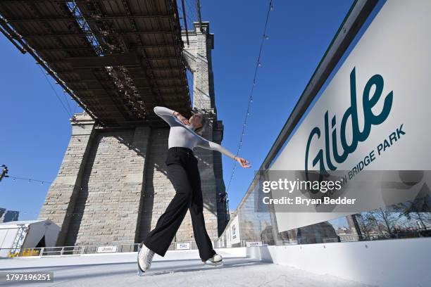 Kaitlyn Weaver ice skates at the Season Opening of Glide at Emily Warren Roebling Plaza, Brooklyn Bridge Park on November 16, 2023 in Brooklyn, New...