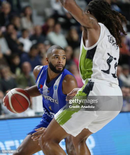 Emanuel Terry of Manisa Buyuksehir Belediyespor in action against Aaron Harrison of Porto during the FIBA Europe Cup Group E match between Manisa...