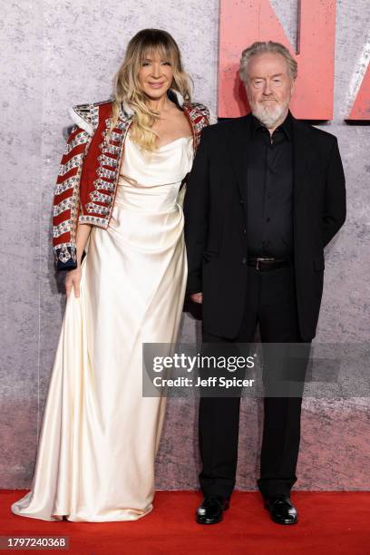 Giannina Facio and Ridley Scott attend the "Napoleon" UK Premiere at Odeon Luxe Leicester Square on November 16, 2023 in London, England.