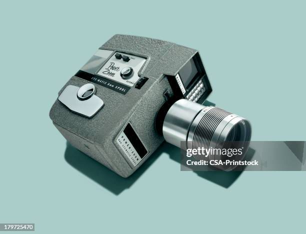 movie camera - old fashioned camera stock illustrations