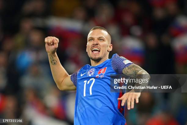 Lukas Haraslin of Slovakia celebrates after scoring the team's third goal during the UEFA EURO 2024 European qualifier match between Slovakia and...