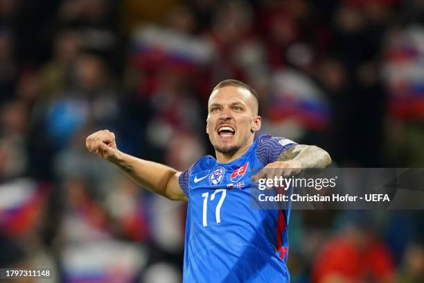 Lukas Haraslin of Slovakia celebrates after scoring the team's third goal during the UEFA EURO 2024 European qualifier match between Slovakia and...