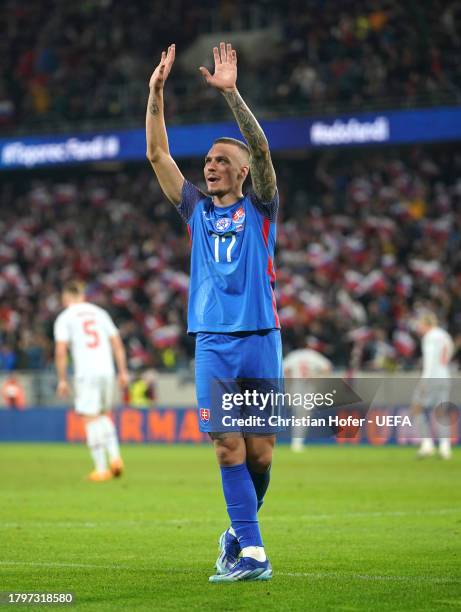 Lukas Haraslin of Slovakia celebrates after scoring the team's fourth goal during the UEFA EURO 2024 European qualifier match between Slovakia and...