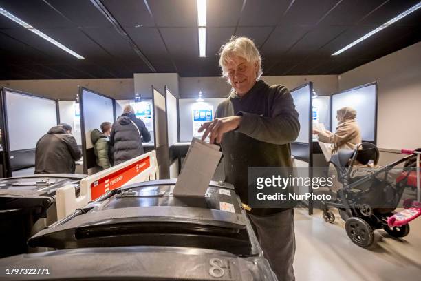 General election in the Netherlands in a historic moment citizens vote for the next government. Dutch voters go the polls, they line up to cast their...