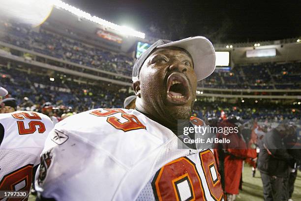 Defensive tackle Warren Sapp of the Tampa Bay Buccanneers celebrates following the NFC Championship game against the Philadelphia Eagles on January...