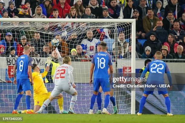 Andri Gudjohnsen of Iceland scores the team's second goal during the UEFA EURO 2024 European qualifier match between Slovakia and Iceland at Narodny...