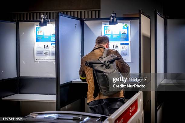 General election in the Netherlands in a historic moment citizens vote for the next government. Dutch voters go the polls, they line up to cast their...