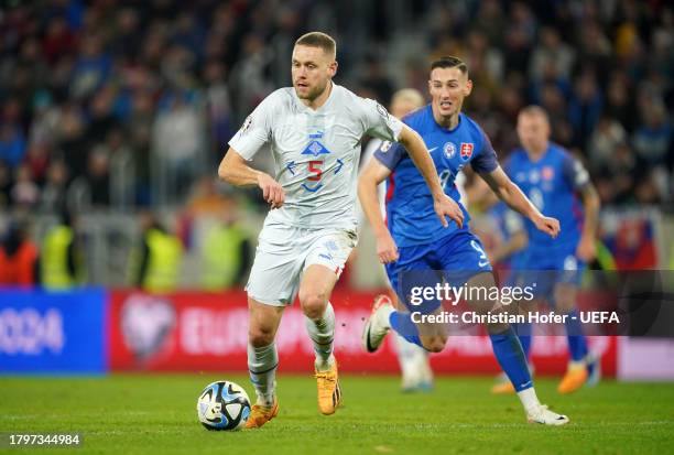 Sverrir Ingason of Iceland runs with the ball during the UEFA EURO 2024 European qualifier match between Slovakia and Iceland at Narodny futbalovy...