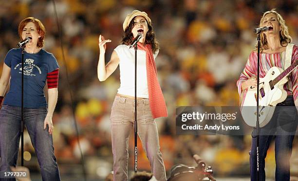 SHeDAISY plays at the halftime show of the FedEx Orange Bowl at Pro Player Stadium on January 2, 2003 in Miami, Florida. The University of Southern...