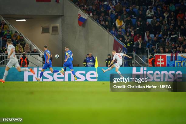 Alfred Finnbogason of Iceland crosses the ball during the UEFA EURO 2024 European qualifier match between Slovakia and Iceland at Narodny futbalovy...