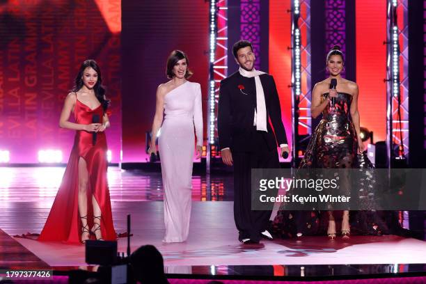 Co-hosts Danna Paola, Paz Vega, Sebastián Yatra, and Roselyn Sánchez speak onstage during The 24th Annual Latin Grammy Awards on November 16, 2023 in...