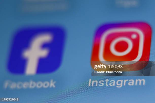 Facebook and Instagram icons displayed on a phone screen are seen in this illustration photo taken in Krakow, Poland on November 22, 2023.