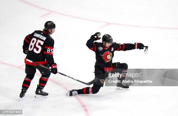 Tim Stutzle of the Ottawa Senators reacts after scoring in the overtime period of the 2023 NHL Global Series in Sweden between the Detroit Red Wings...