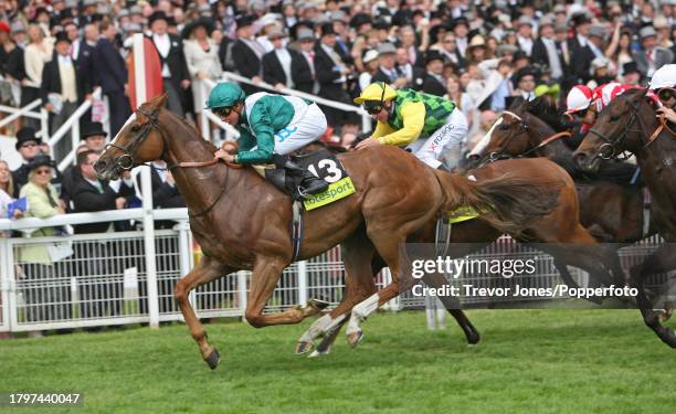 Jockey William Buick riding Holbeck Ghyll winning the Dash Stakes at Epsom, 7th June 2008. Placed second Irish Jockey John Egan riding Merlin's...