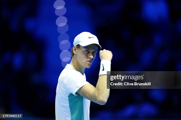 Jannik Sinner of Italy celebrates against Holger Rune of Denmark during the Men's Singles Round Robin match on day five of the Nitto ATP Finals at...