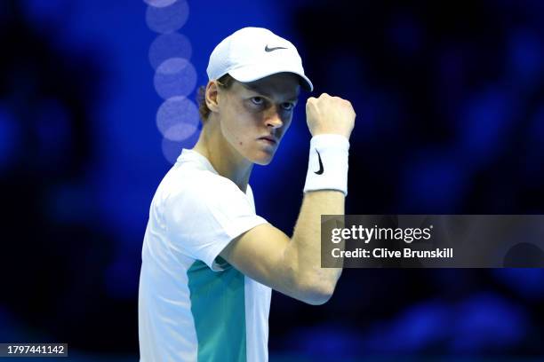 Jannik Sinner of Italy celebrates against Holger Rune of Denmark during the Men's Singles Round Robin match on day five of the Nitto ATP Finals at...