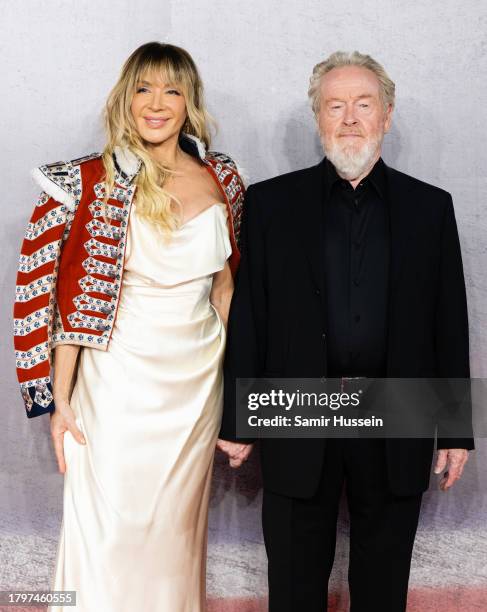 Giannina Facio and Ridley Scott attend the "Napoleon" UK Premiere at Odeon Luxe Leicester Square on November 16, 2023 in London, England.