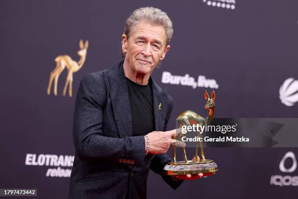 Peter Maffay poses with award trophy during the 75th Bambi Awards at Bavaria Filmstadt on November 16, 2023 in Munich, Germany.