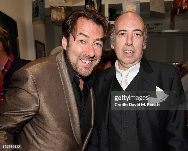 Jonathan Ross and Mick Jones attend the launch of 'Black Market Clash', an exhibition of personal memorabilia and items curated by original members...