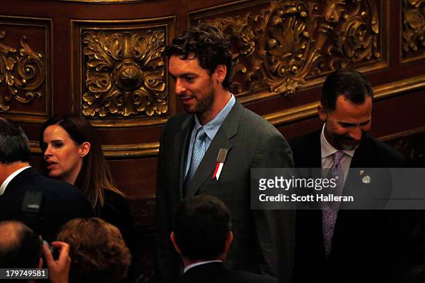 Spanish basketball player Pau Gasol and Prince Felipe of Spain depart the Opening Ceremony of the 125th IOC Session at Teatro Colon on September 6,...