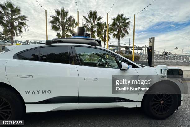 Waymo car drives a street in Santa Monica, United States on November 15, 2023.