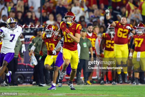 Trojans tight end Jude Wolfe catches the ball for a gain during a college football game between the Washington Huskies against the USC Trojans on...