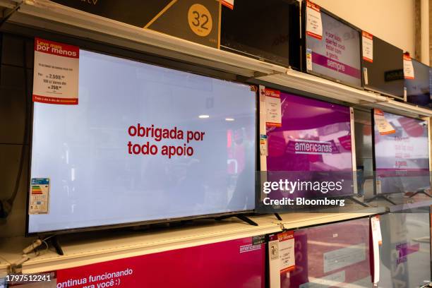 Televisions for sale displays messages of support from customers in a Americanas store in Sao Paulo, Brazil, on Wednesday, Nov. 22, 2023. Americanas,...