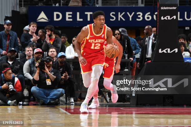 De'Andre Hunter of the Atlanta Hawks dribbles the ball during the game against the Brooklyn Nets on November 22, 2023 at State Farm Arena in Atlanta,...