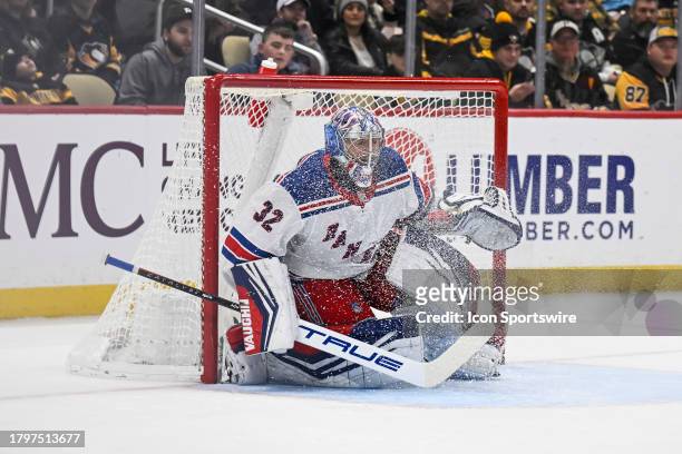 New York Rangers goaltender Jonathan Quick tends net during the second period in the NHL game between the Pittsburgh Penguins and the New York...
