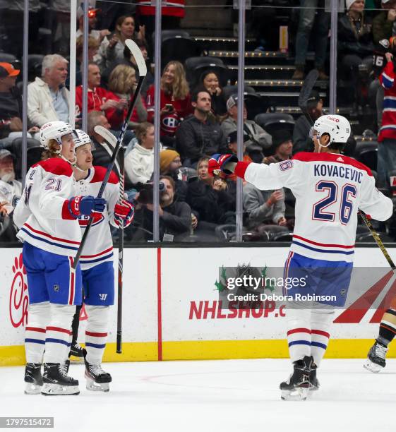 Kaiden Guhle of the Montreal Canadiens celebrates his goal with teammates during the first period against the Anaheim Ducks at Honda Center on...