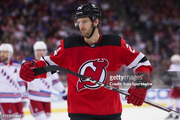New Jersey Devils defenseman Colin Miller looks on during a game between the New York Rangers and New Jersey Devils on November 18, 2023 at...