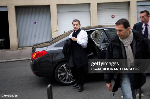 France's President and Union for a Popular Movement party candidate for 2012 presidential election Nicolas Sarkozy arrives to attend a France Inter...