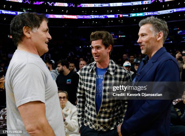 Owner Mark Cuban of the Dallas Mavericks talks with actor Andrew Garfield after the basketball game between the Los Angeles Lakers and the Dallas...