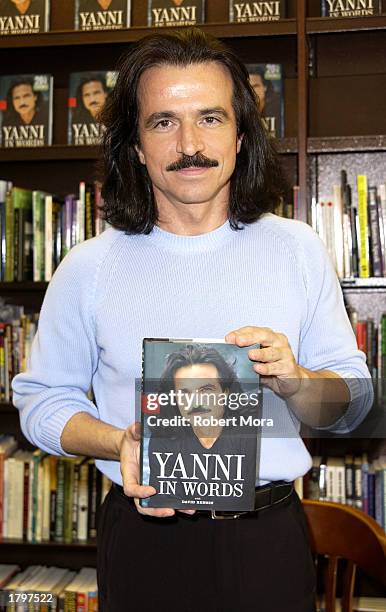 Yanni Signs His New Book In Words Photos and Premium High Res Pictures ...