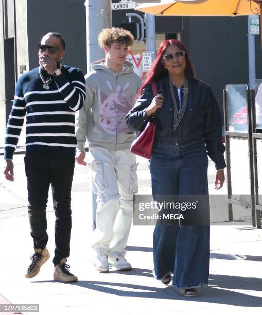 Garcelle Beauvais, Jax Joseph Nilon, and Oliver Saunders are seen leaving lunch on November 21, 2023 in Los Angeles, California.