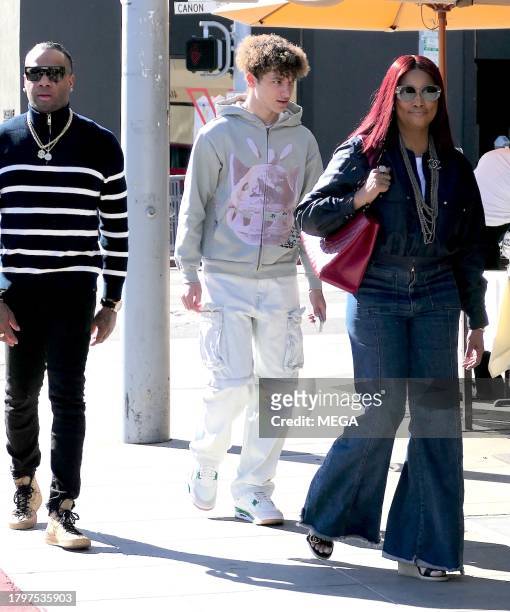 Garcelle Beauvais, Jax Joseph Nilon, and Oliver Saunders are seen leaving lunch on November 21, 2023 in Los Angeles, California.