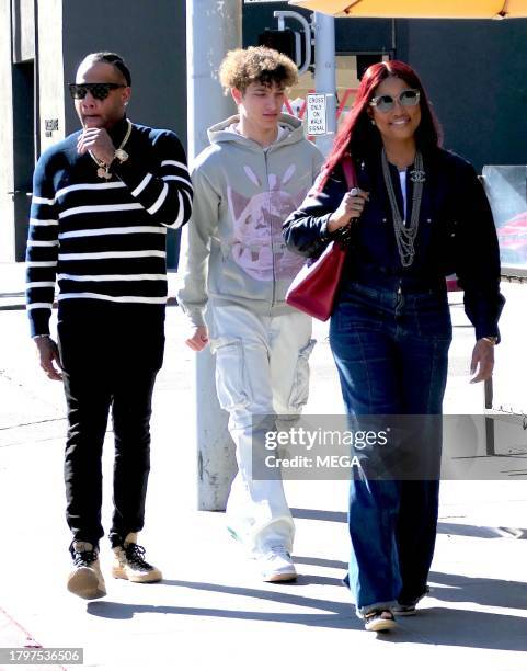 Garcelle Beauvais, Jax Joseph Nilon, and Oliver Saunders are seen leaving lunch on November 21, 2023 in Los Angeles, California.