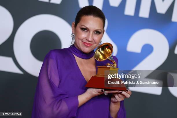 Niña Pastori poses with the Best Flamenco Album Award in the media center for The 24th Annual Latin Grammy Awards at FIBES Conference and Exhibition...