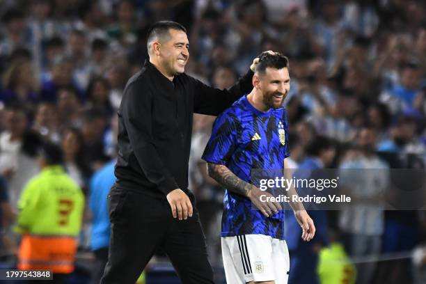 Roman Riquelme, vice-president of Boca Juniors greets Lionel Messi of Argentina prior to a FIFA World Cup 2026 Qualifier match between Argentina and...