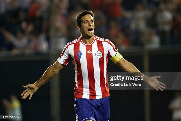 Roque Santa Cruz of Paraguay celebrates the second goal during a match between Paraguay and Bolivia as part of the 15th round of the South American...