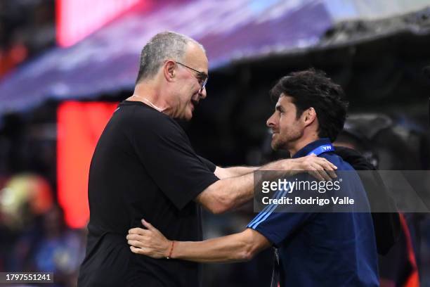 Marcelo Bielsa, head coach of Uruguay, greets Pablo Aimar, assistant coach of Argentina, during a FIFA World Cup 2026 Qualifier match between...