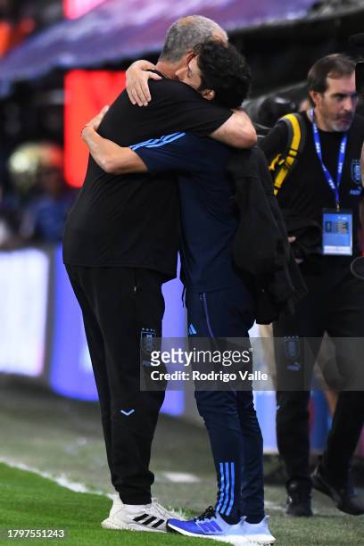 Marcelo Bielsa, head coach of Uruguay, greets Pablo Aimar, assistant coach of Argentina, during a FIFA World Cup 2026 Qualifier match between...