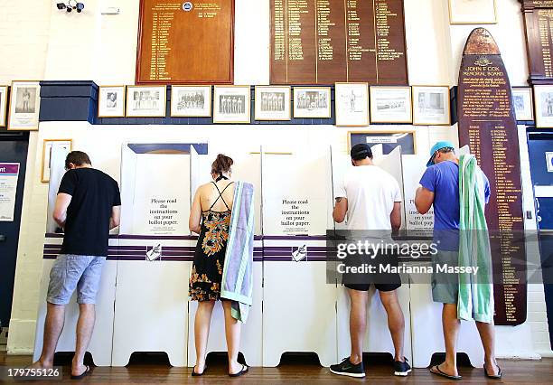 Voters head to the polls in Bondi Beach in the electorate of Wentworth on election day on September 7, 2013 in Sydney, Australia. Voters head to the...