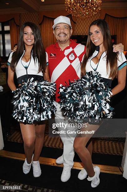 Actor Ice-T poses at GBK & Sparkling Resort Fashionable Lounge during Mercedes-Benz Fashion Week on September 6, 2013 in New York City.