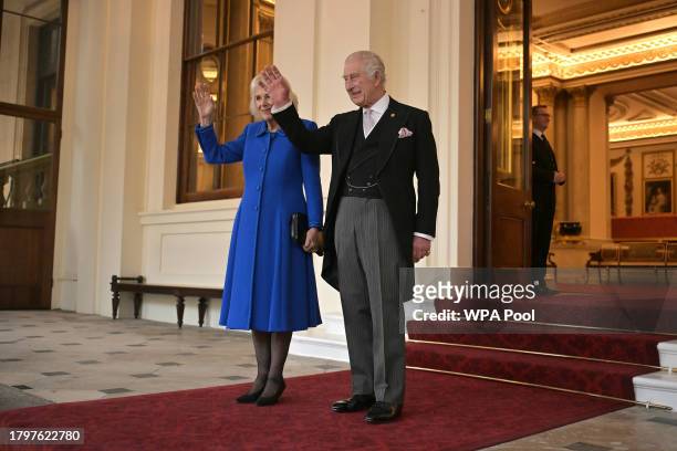 King Charles III and Queen Camilla wave during a formal farewell to South Korea's President Yoon Suk Yeol and South Korea's First Lady Kim Keon Hee,...