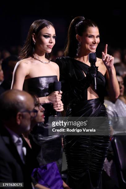 Co-hosts Danna Paola and Roselyn Sánchez speak onstage during The 24th Annual Latin Grammy Awards on November 16, 2023 in Seville, Spain.