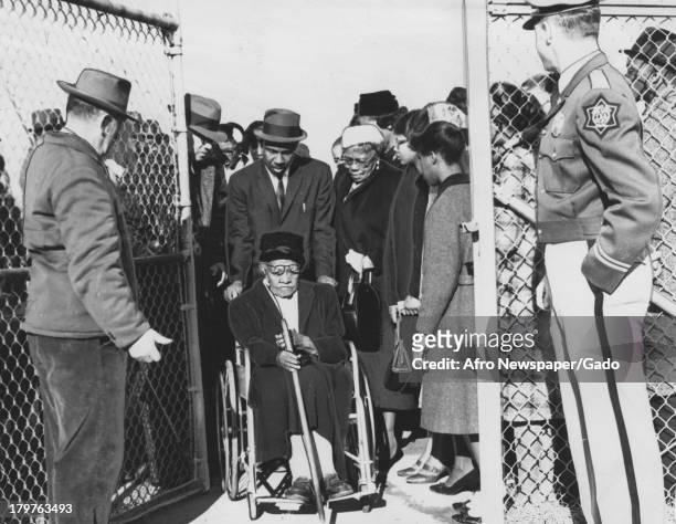 Mrs Mary Gill, proud 95-year-old great-grandmother of John A Gaines of the Friendship Nine imprisoned in the Rock Hill sit-ins, enters the prison...