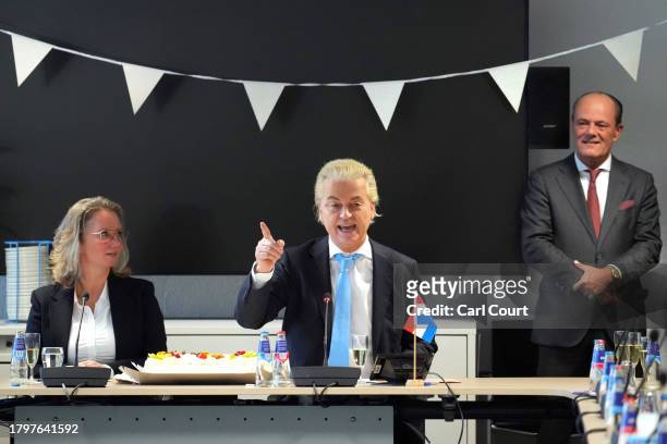 Geert Wilders, the leader of the Dutch Party for Freedom , sits next to Dutch MP Fleur Agema as he delivers a speech at a post-election meeting at...